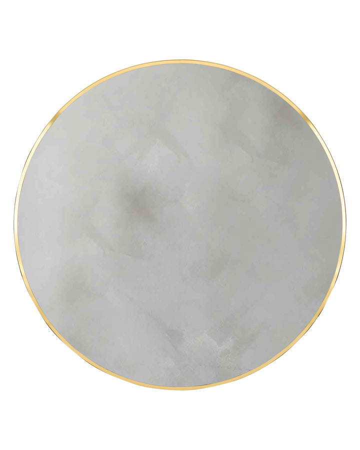 Large round wall mirror with gold frame and reflective grey-toned glass surface.