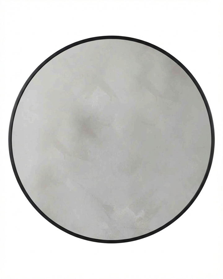 Large round wall mirror with black frame and reflective glass surface