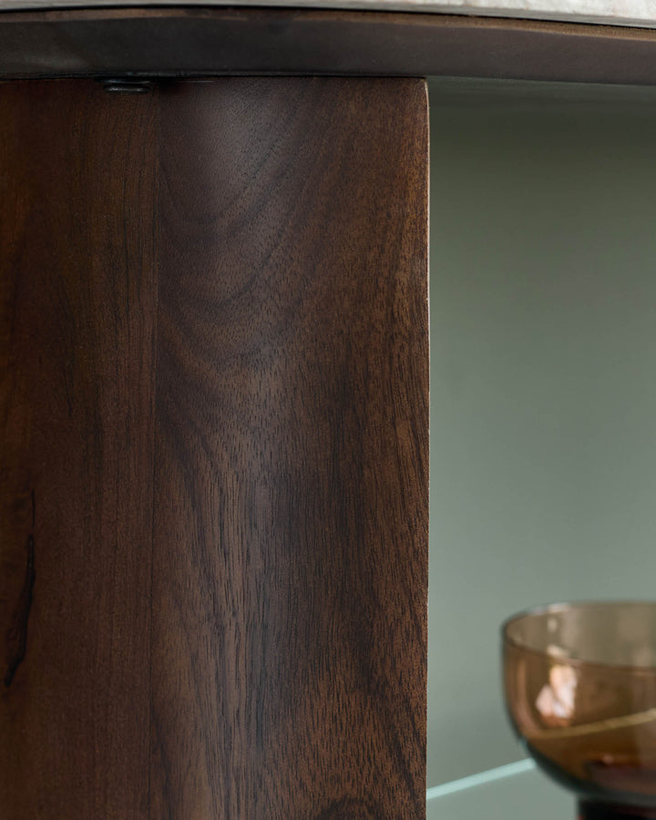 Dark wood console table with polished finish and marble top detail visible on right side.