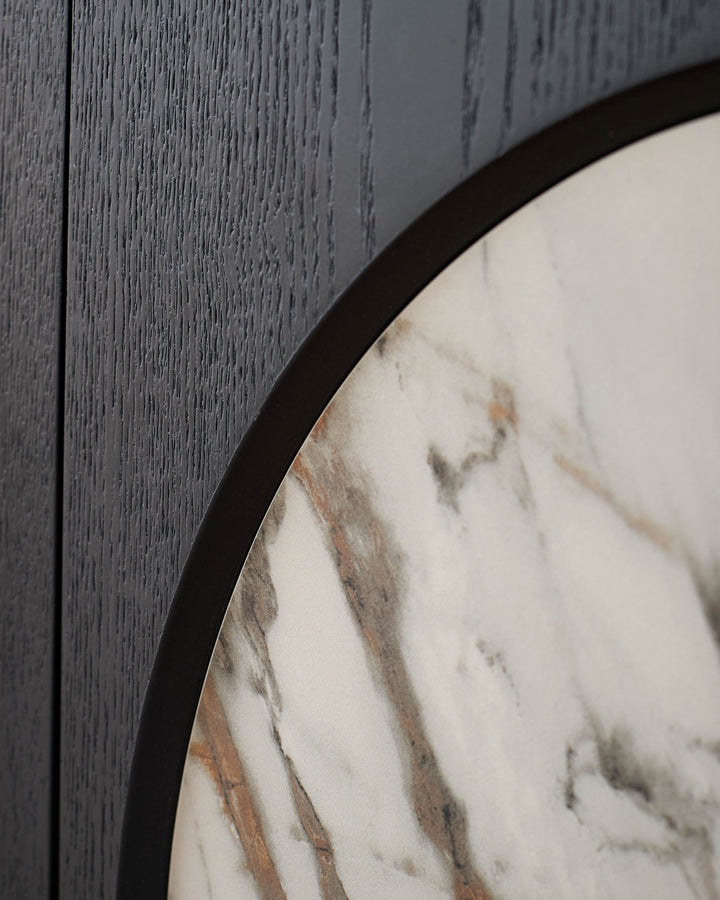 Large sideboard with dark grey wood-grain finish and curved marble top featuring grey and brown veining detail.