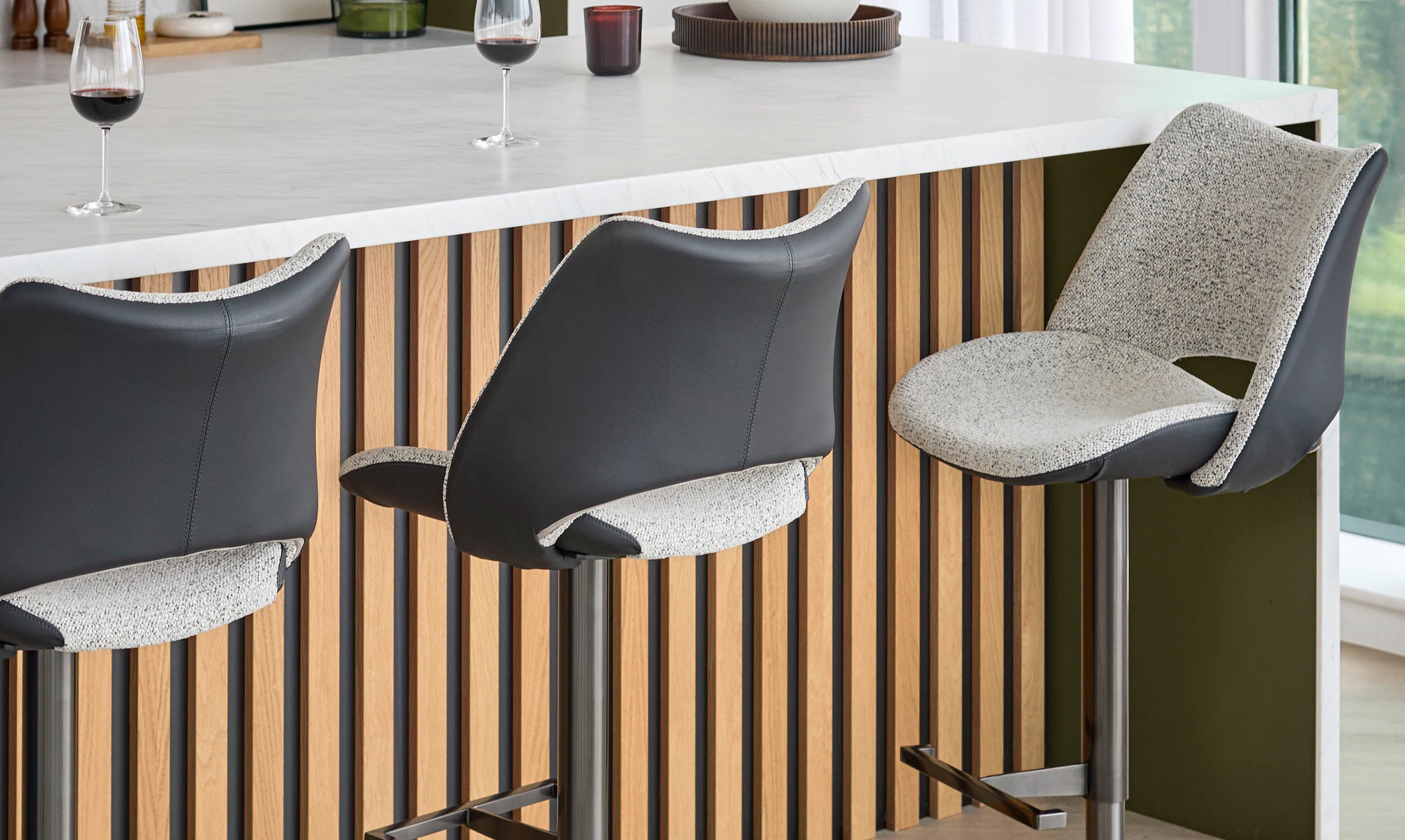 Bronwyn grey fabric and black leather gas lift bar stool