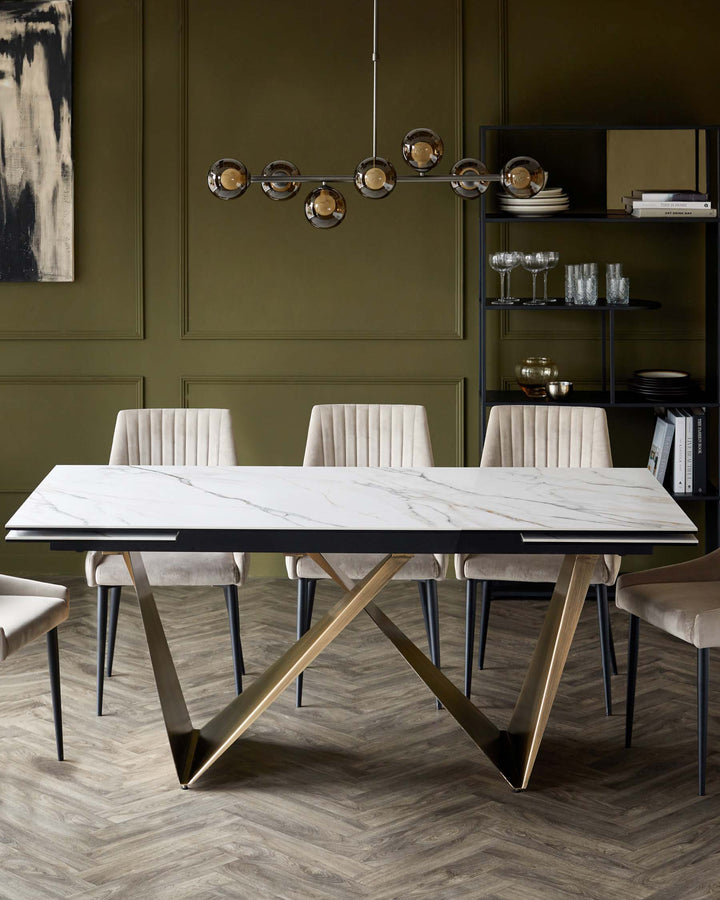 Modern dining table with a marble top, gold V-shaped base, and elegant beige upholstered chairs. Stylish lighting overhead.