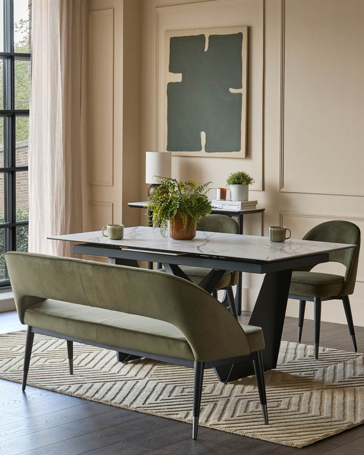 Dining room furniture set with bench seating, table and chairs in neutral tones.