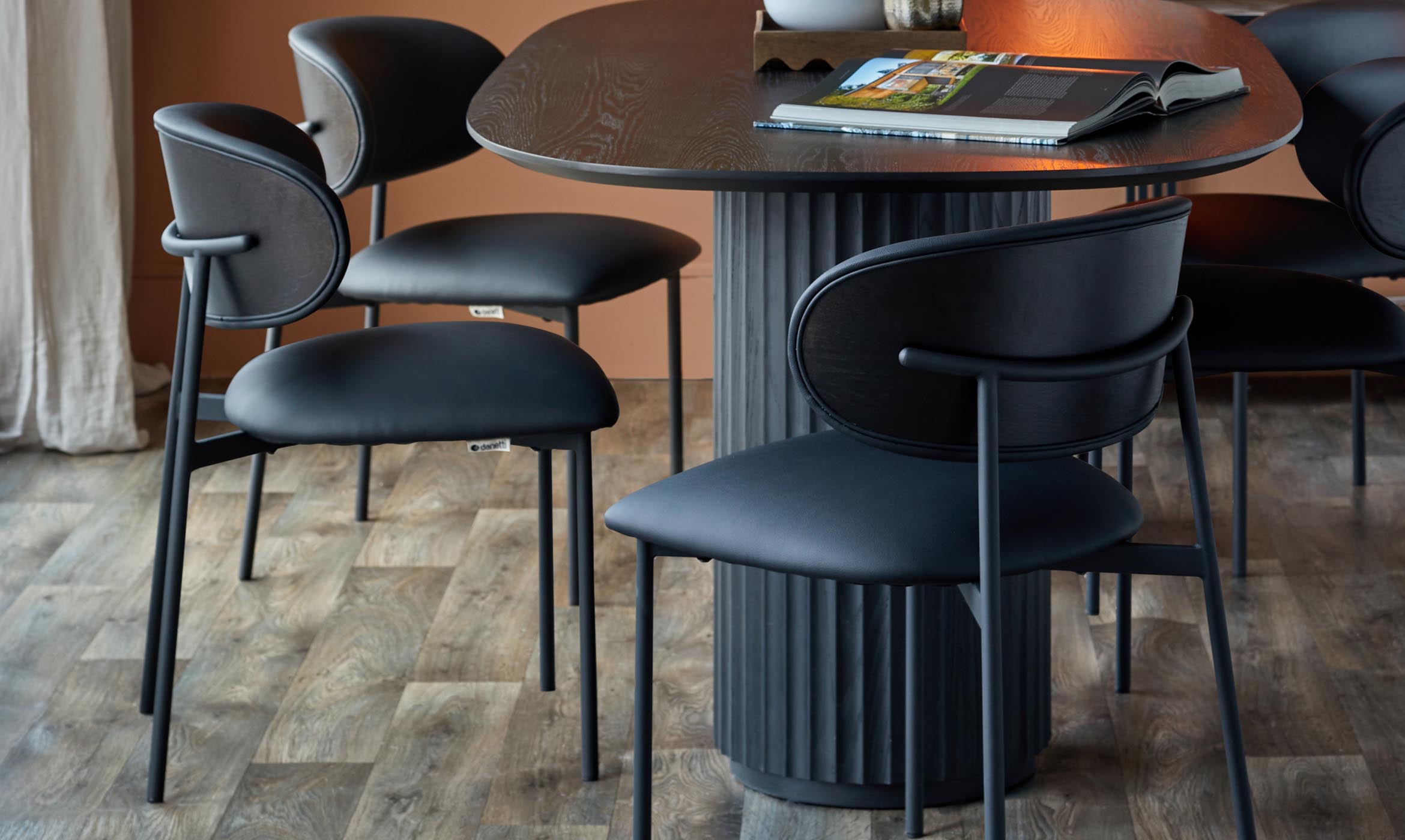 Cree black faux leather dining chair