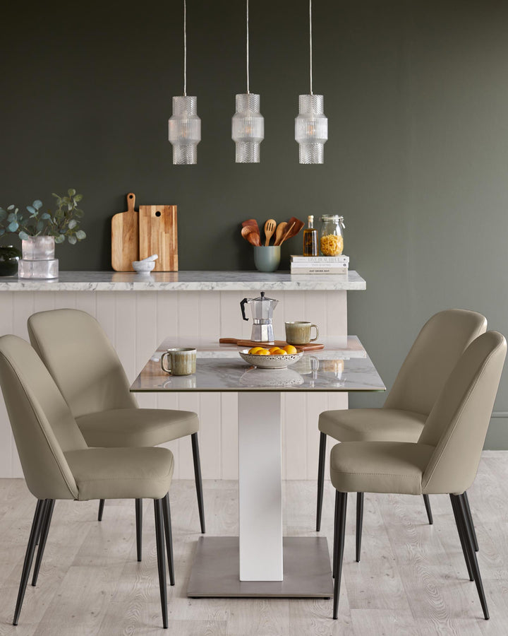 Contemporary dining set with four chairs, a marble table, and three hanging lights. Stylish and modern.