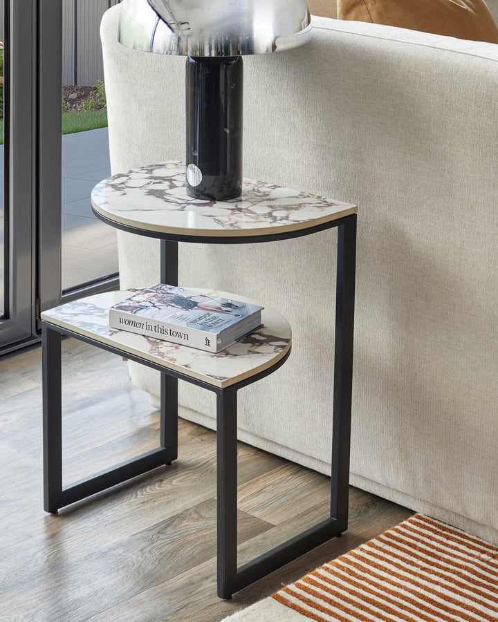 A two-tiered side table with a marble-effect top and black metal frame. Modern & stylish, perfect for any living space.