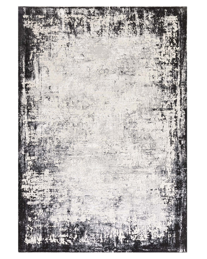 A stylish, contemporary rug with a distressed black and white design, adding a touch of modern elegance to any space.