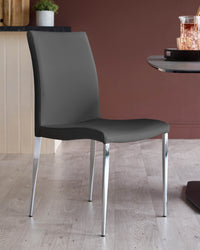 A stylish grey dining chair with sleek chrome legs adds a modern touch to any dining space.