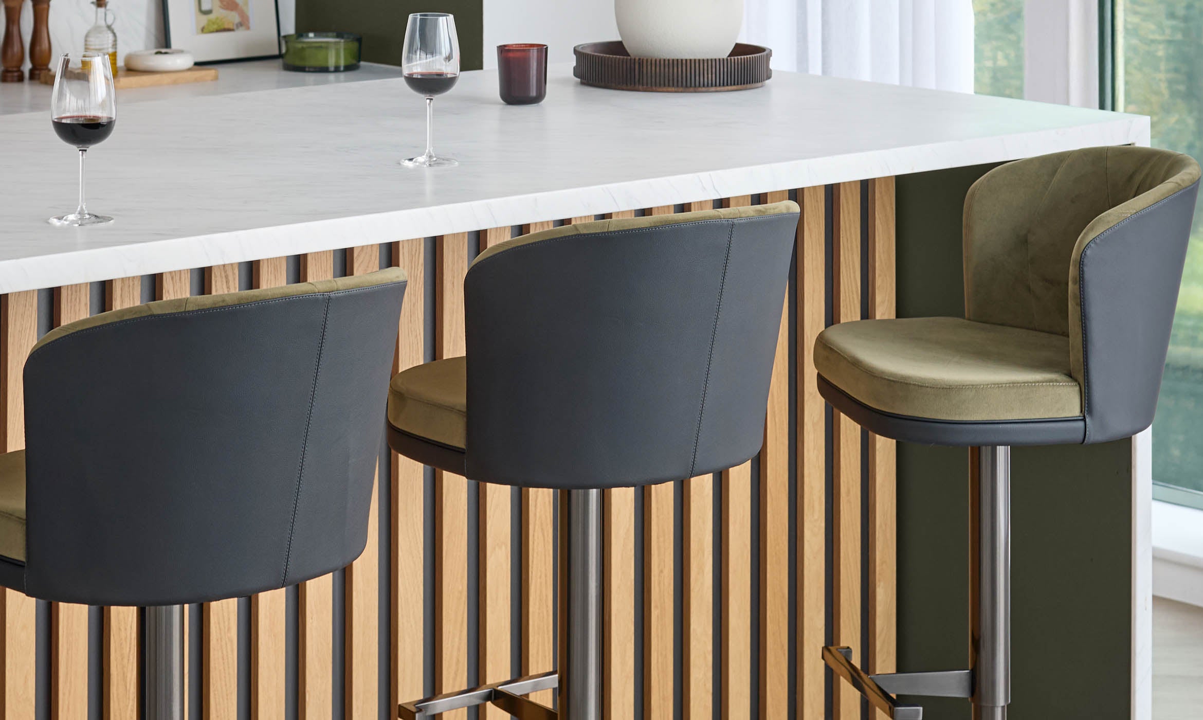 Elodie olive green velvet and black faux leather gas lift bar stool