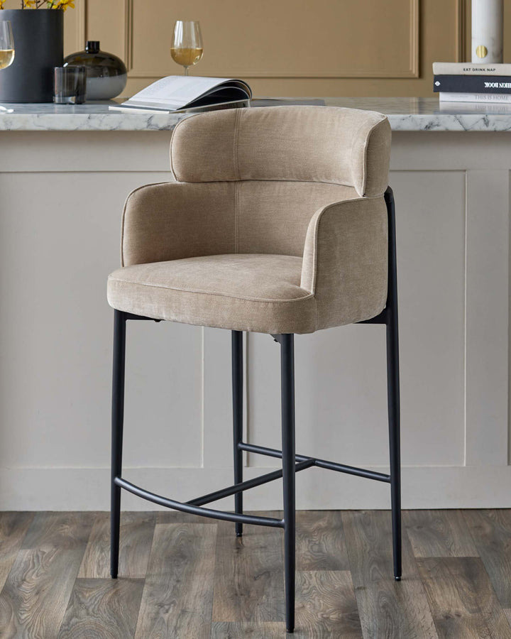 Upholstered bar stool in beige fabric with black metal legs. Contemporary design for kitchen or bar area.