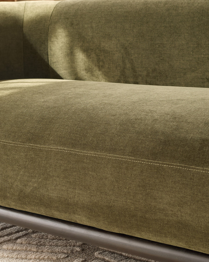 Florence 3-seater sofa in olive-green weave fabric, close-up of seat and backrest detail.