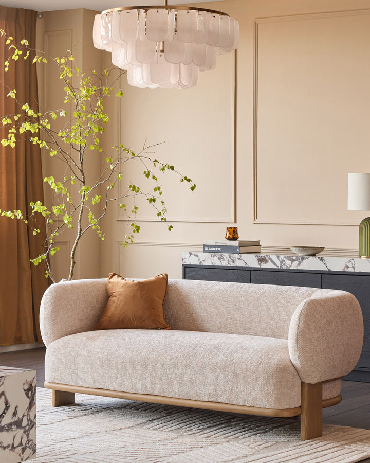 Florence 2-seater sofa in natural wood and beige fabric, displayed in a styled living room setting.