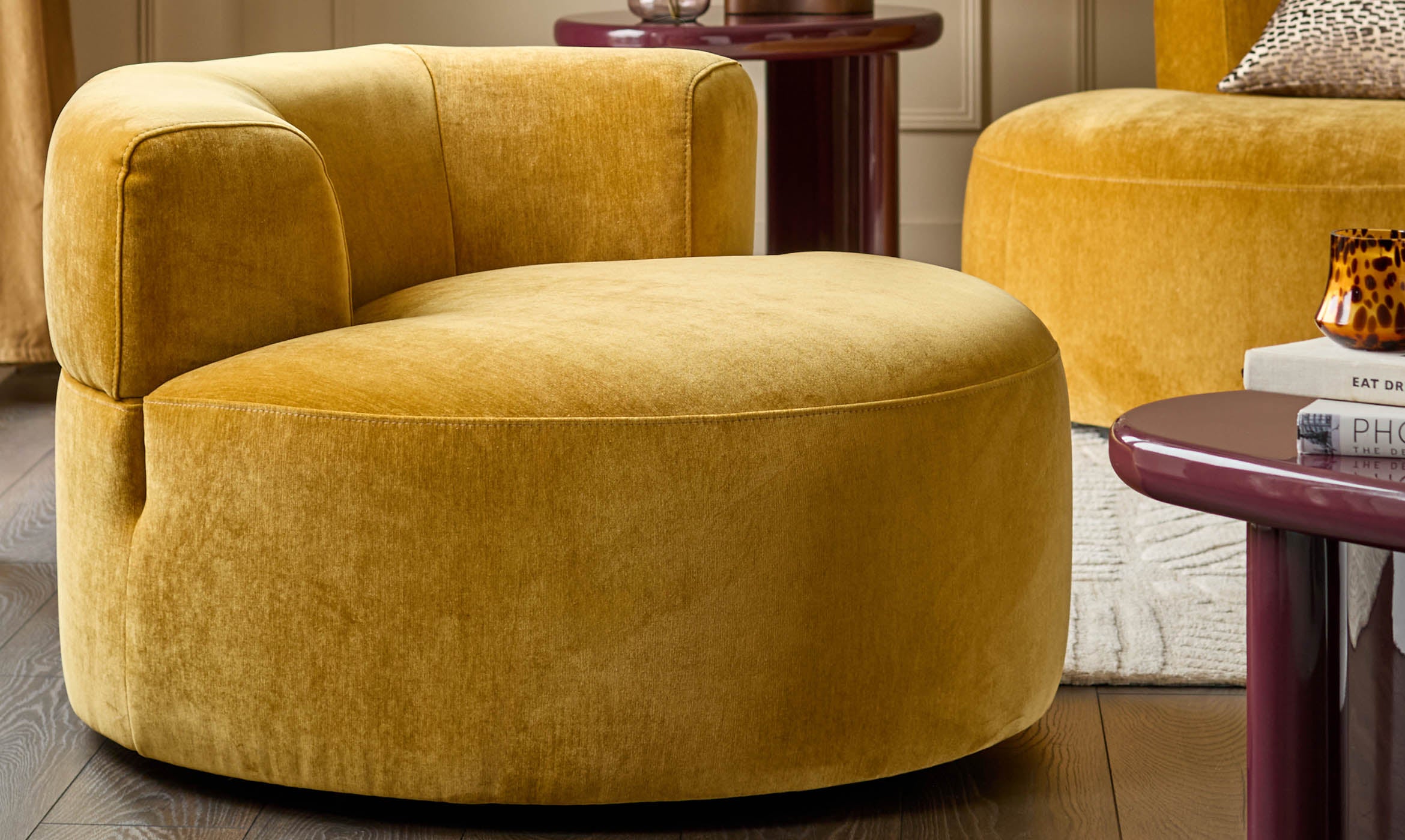 Gianna ochre fabric swivel armchair