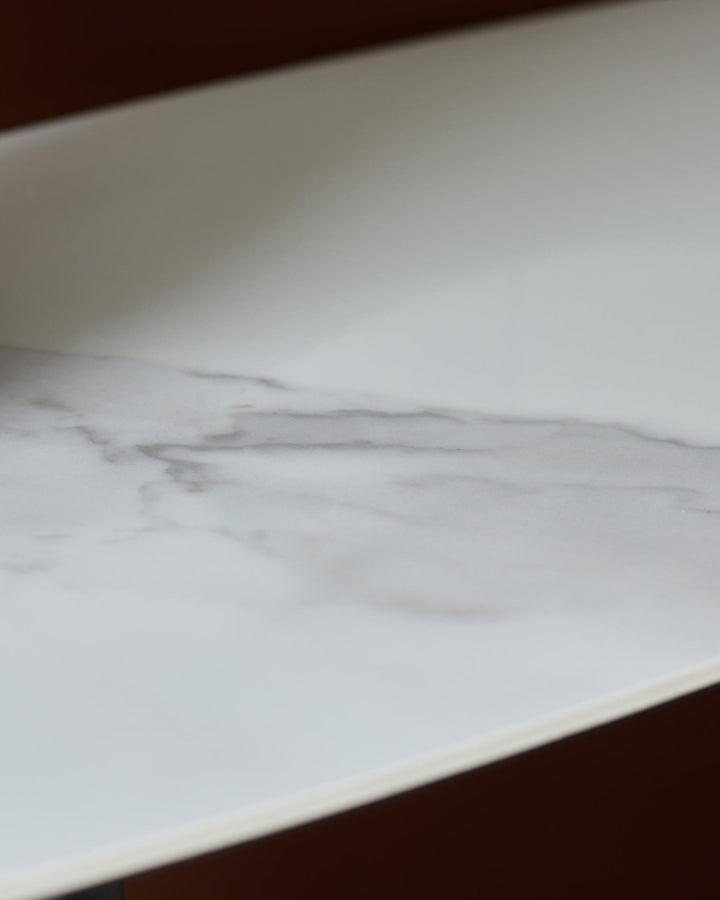 Close-up of a marble-effect shelf. A modern piece of furniture.