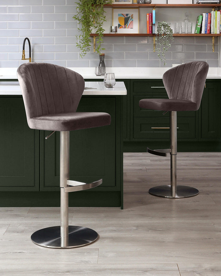 Harper mocha velvet gas lift bar stools with brushed metal bases positioned at a green kitchen island.