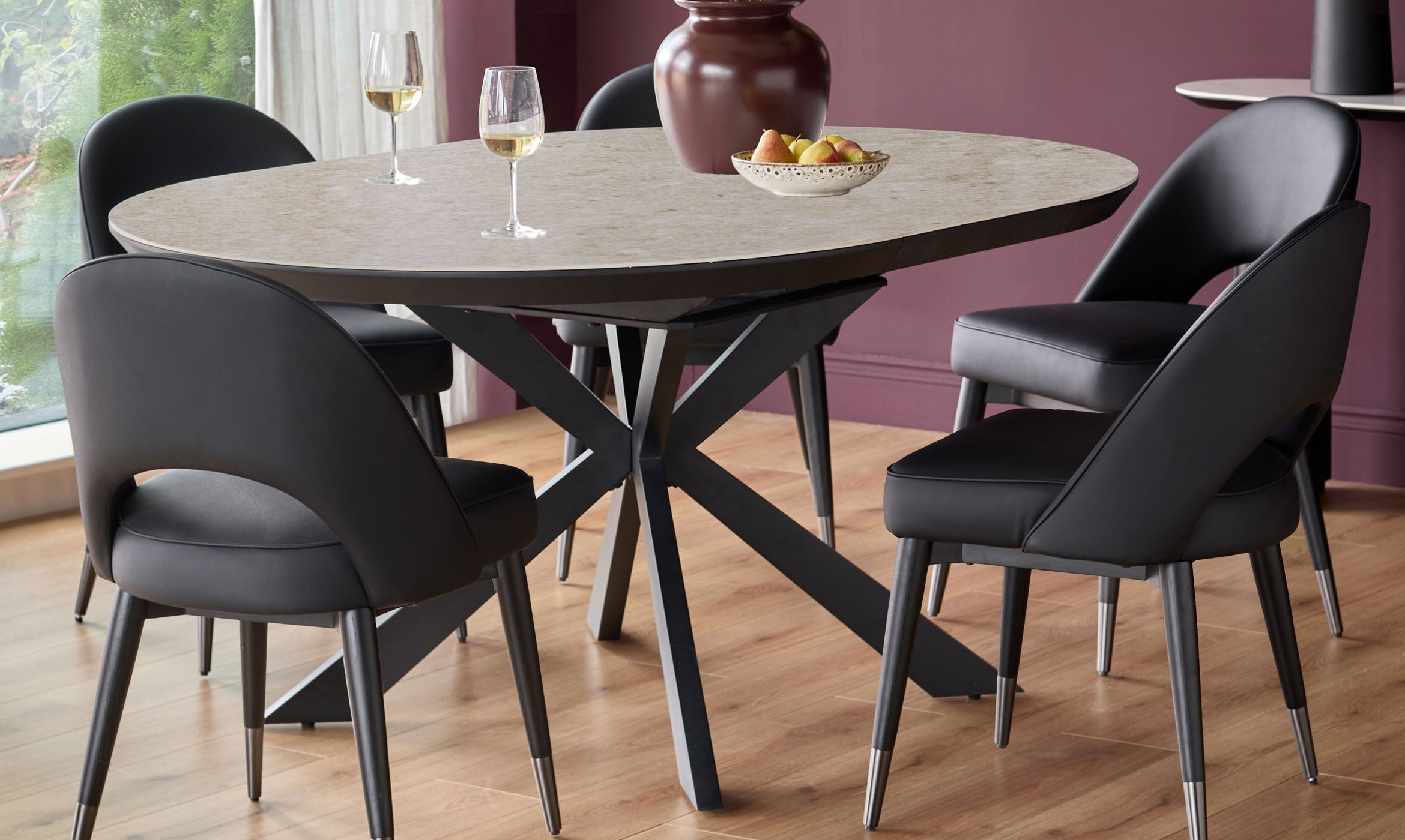 Hayden natural travertine ceramic 4-6 extending round dining table