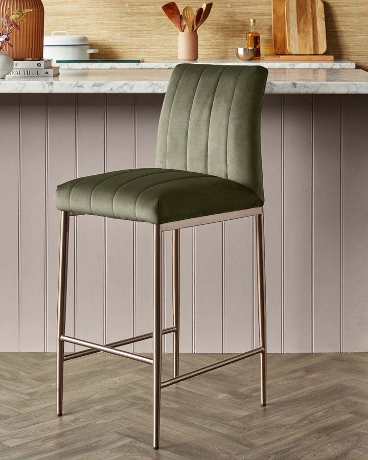 Stylish green velvet bar stool with sleek metal legs, perfect for adding a touch of modern elegance to your kitchen or bar area.