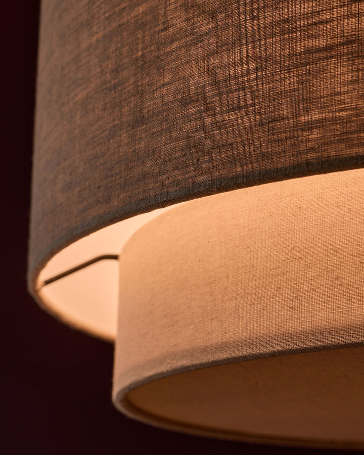 Leonie pendant light with natural linen shade and mocha trim, close-up detail view.