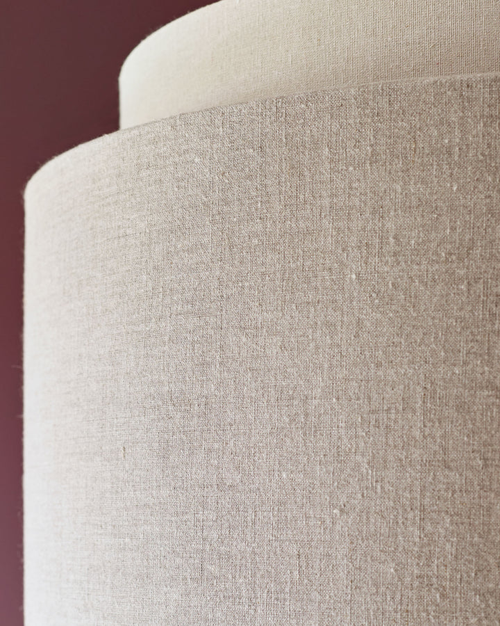 Leonie pendant light with natural linen shade and mocha trim, close-up detail view.