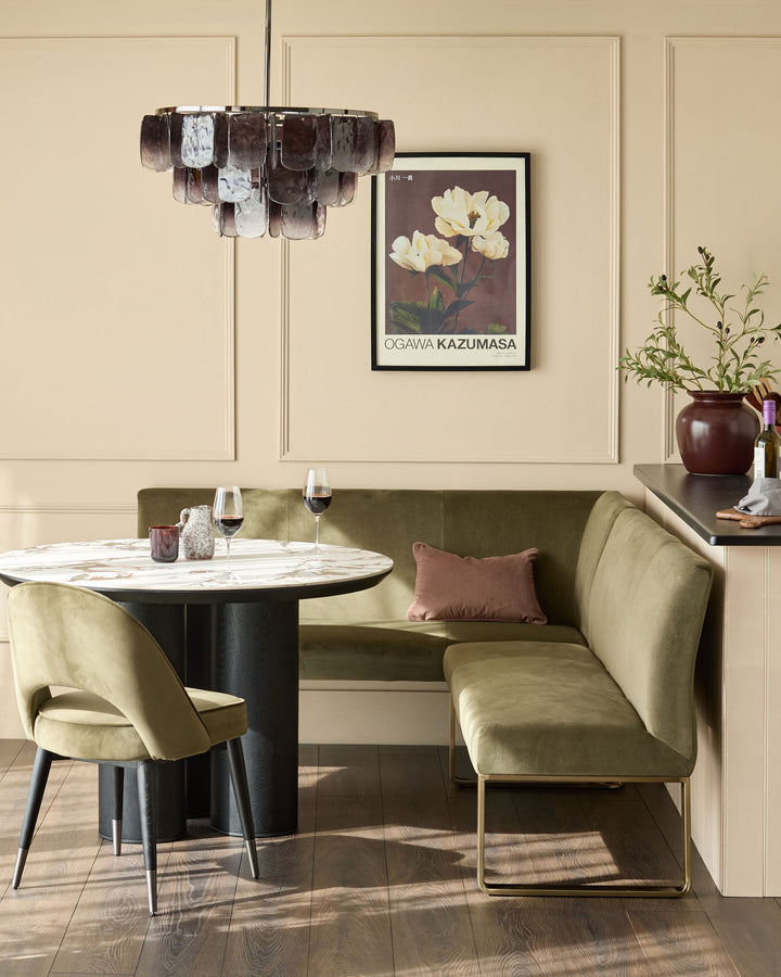 Loop 5-seater right-hand corner bench in olive green with brushed brass frame, styled in dining nook.