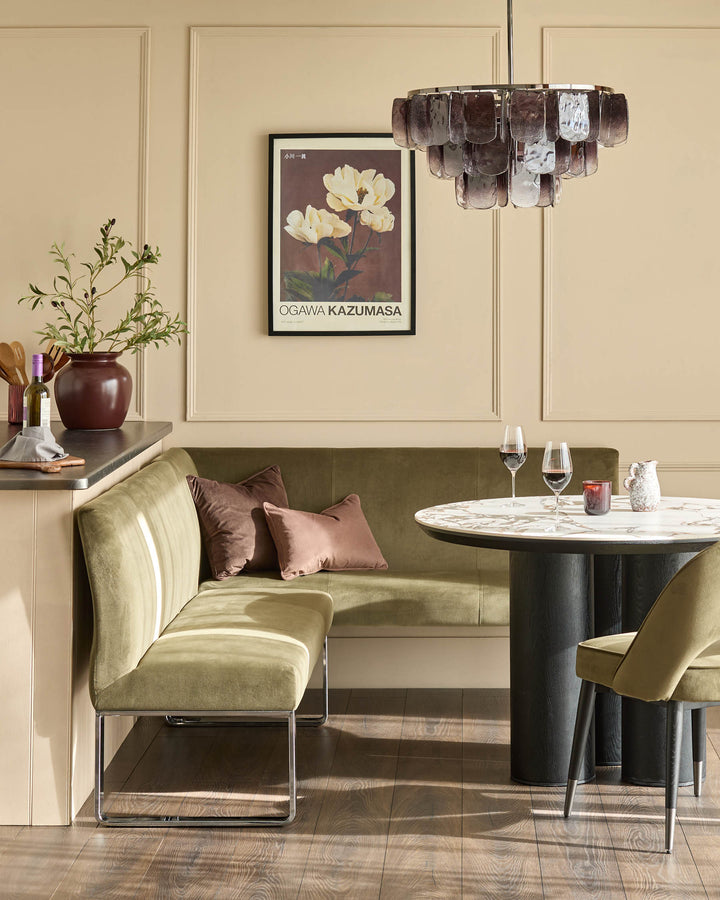 Loop 5-seater left-hand corner bench in olive green velvet with chrome legs, styled in dining room setting.