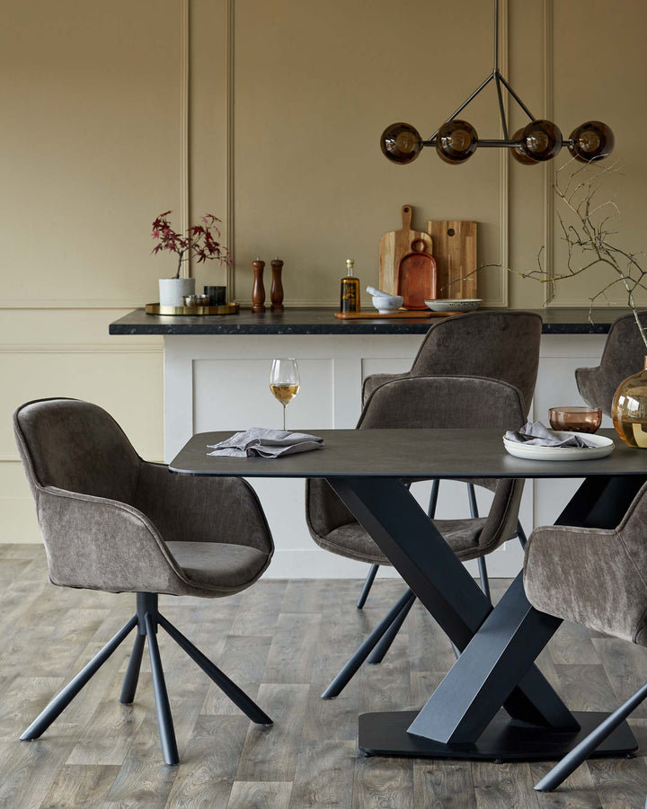 Dining room featuring a dark grey table and brown swivel chairs with a statement pendant light overhead.