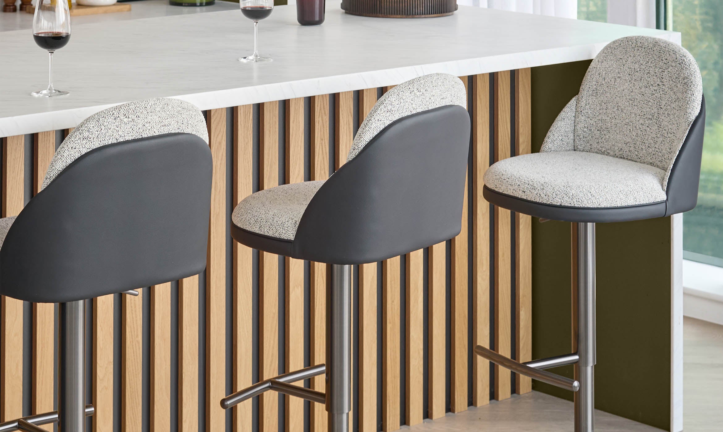 Myra grey fabric and black faux leather gas lift bar stool
