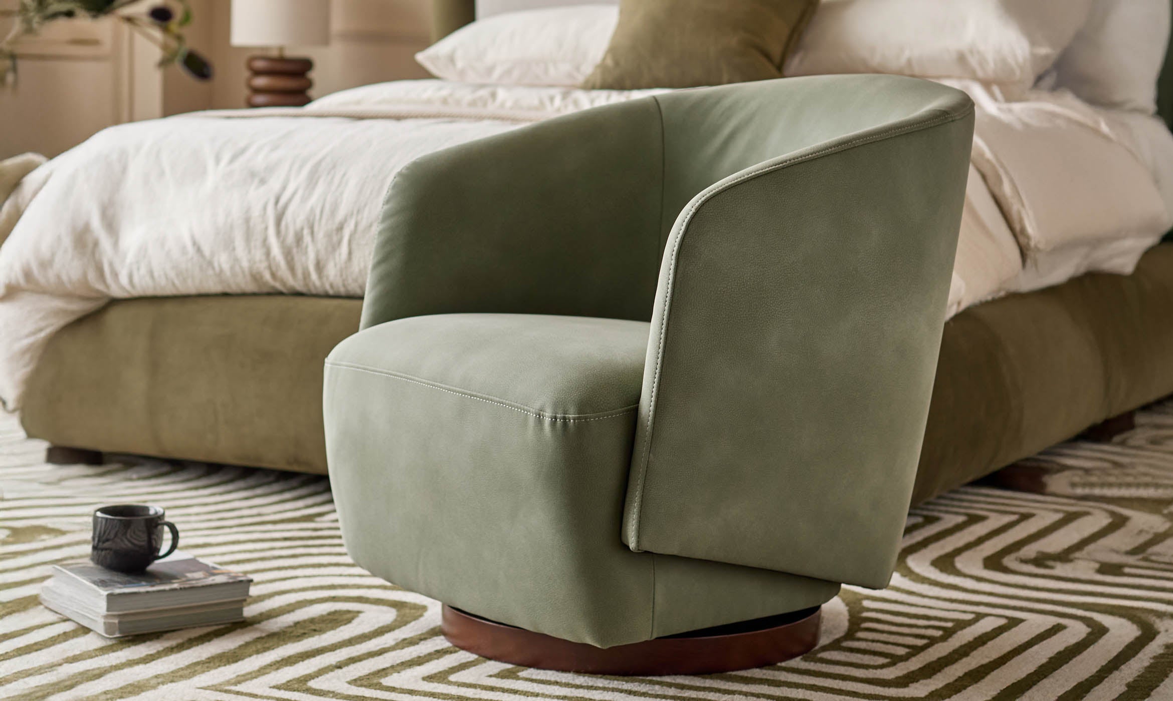 Natalia sage green faux leather swivel accent chair
