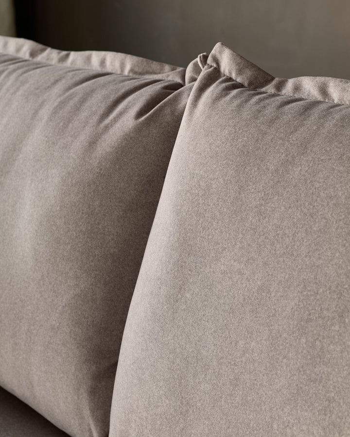 Otto 3-seater sofa in mocha fabric, close-up detail showing soft texture and cushion construction.