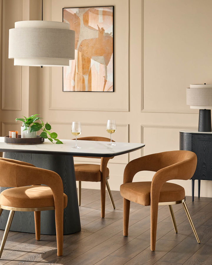A modern dining set with statement chairs, a sleek table, and stylish decor for a contemporary dining space.