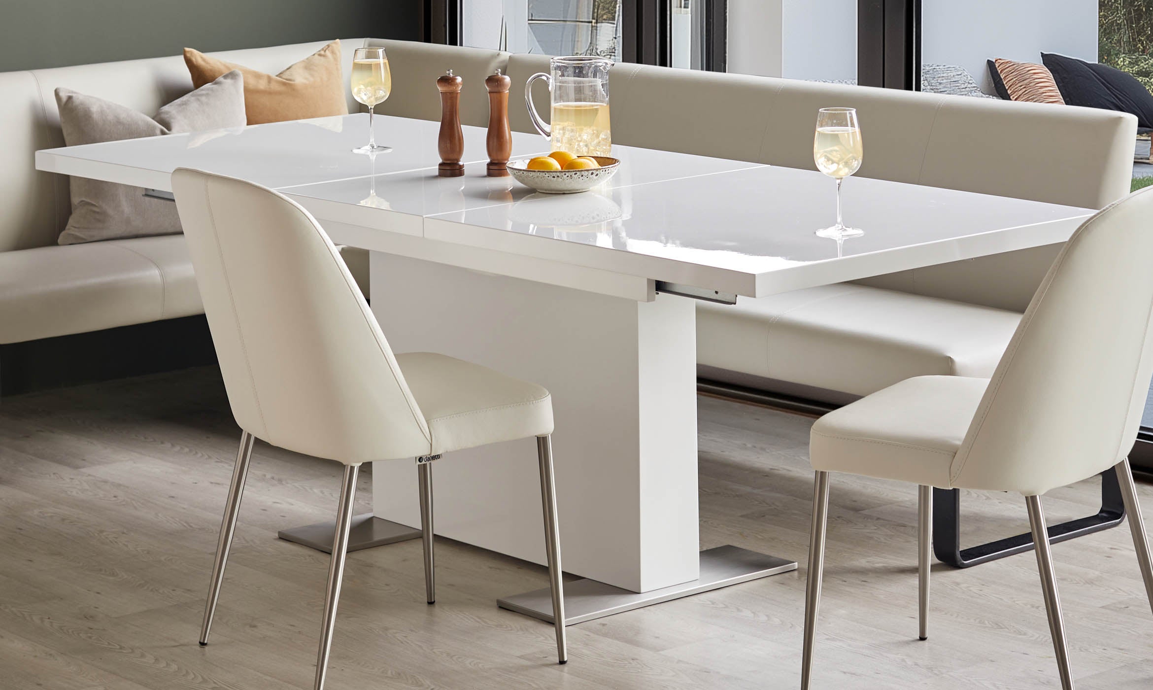 Sanza white gloss extending 6 to 10 seater dining table
