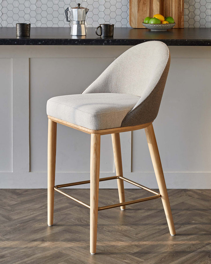 Modern upholstered bar stool with a light wood frame, featuring a comfortable curved back and a sleek design.