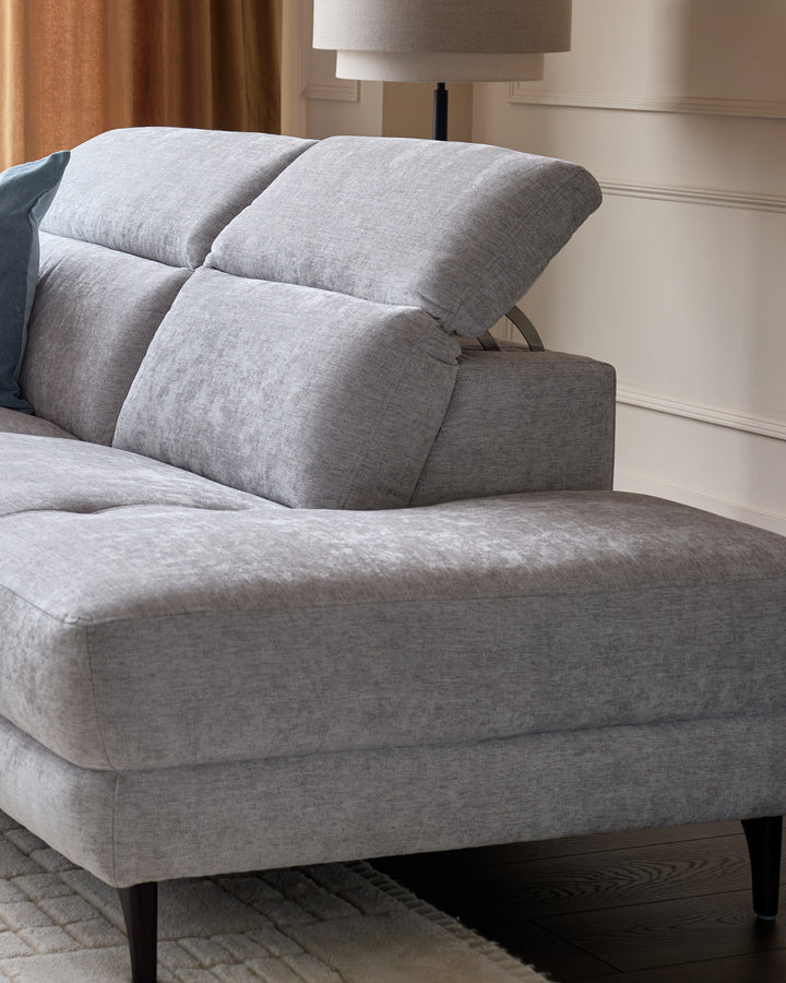 Serene right chaise recliner in light grey chenille, showing plush cushioned back and seat with dark wood legs.