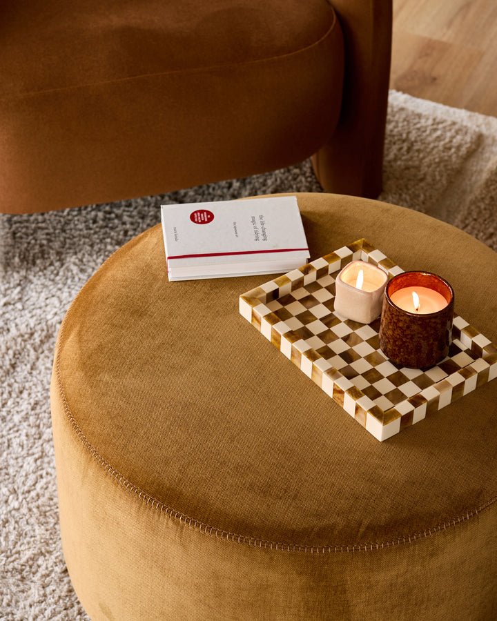 Thea smoked mirror coffee table and ochre fabric pouffe set