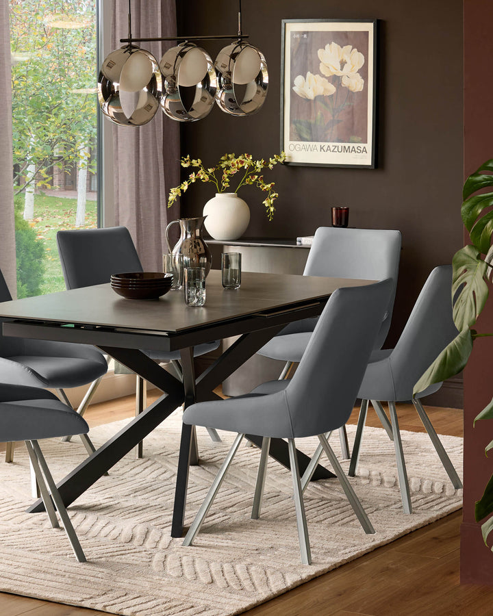 Theo mid-grey faux-leather dining chair with brushed metal legs, shown in a modern dining room setting.