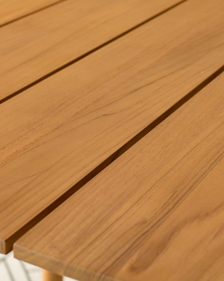 Close-up of teak wood grain and joinery detail on Tuscany Garden dining table surface