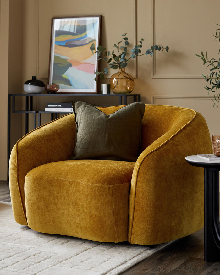 A stylish mustard-yellow armchair with a dark green cushion, complemented by sleek side and console tables.
