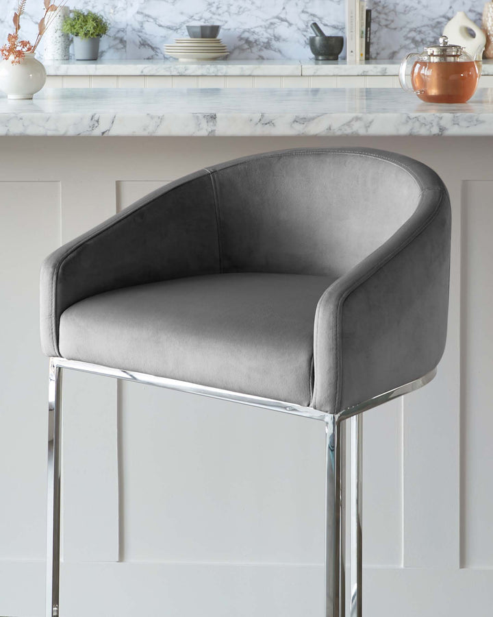 Elegant modern grey velvet barstool with a curved backrest and chrome frame.