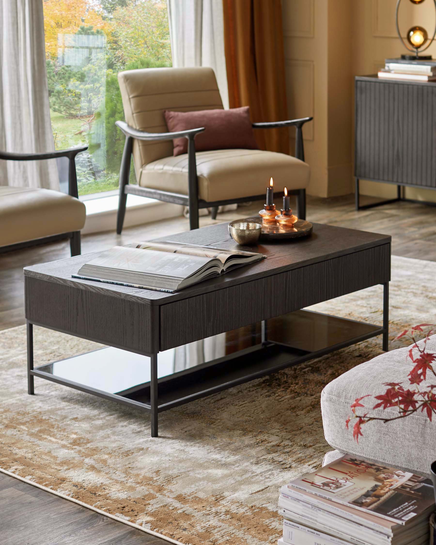 A stylish living room showcasing a coffee table, two armchairs and a sleek sideboard.