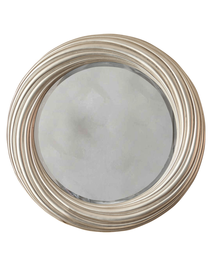 Round mirror with silver finish frame featuring concentric circular grooves and beveled edge detail.