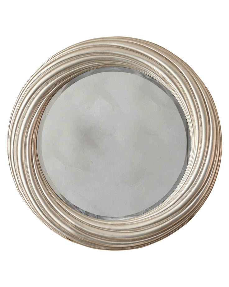 Round mirror with silver finish frame featuring concentric circular grooves and beveled edge detail.