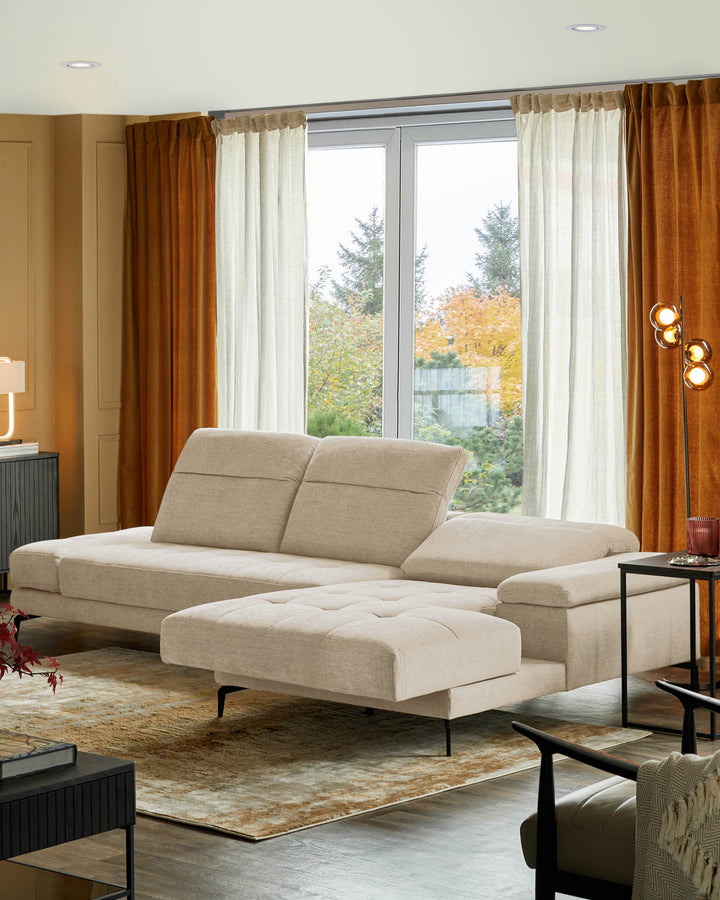 A neutral corner sofa with ottoman in a warm, modern living room setting. Comfortable and stylish furniture.
