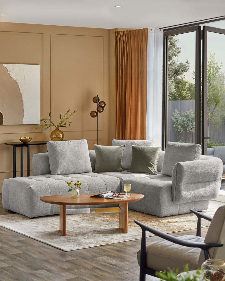 Lillian left small corner sofa in light grey weave, displayed in a warm, modern living room setting.