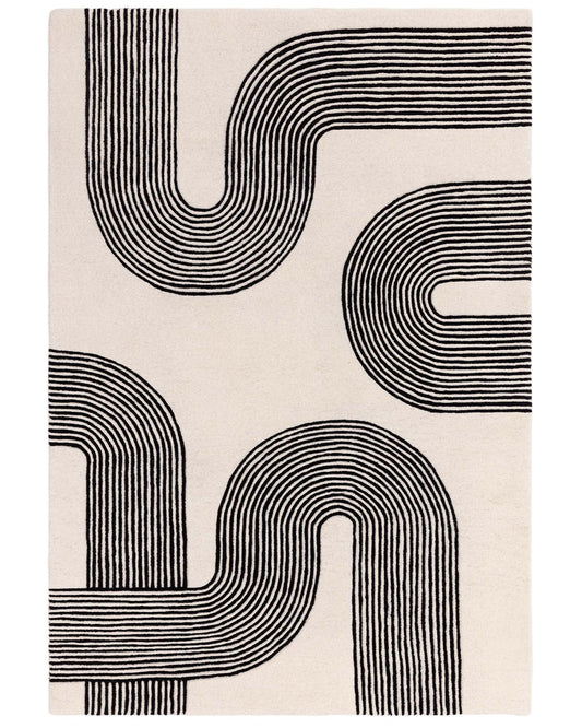 A patterned rug with black lines creating u-shapes on a cream background.