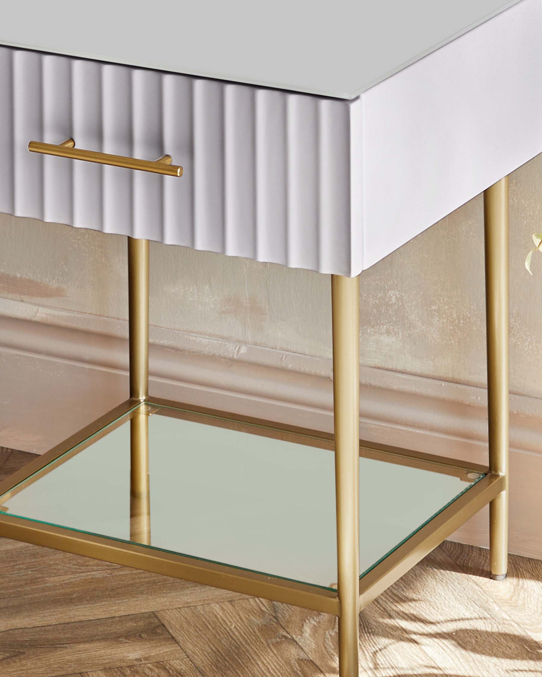Albury bedside table with single drawer, light grey finish, brass legs and handle, glass top shelf detail.