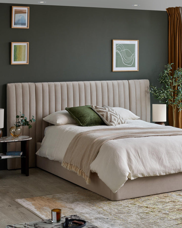 Stylish bedroom featuring a luxurious bed with a fluted headboard, complemented by a side table and tasteful decor.