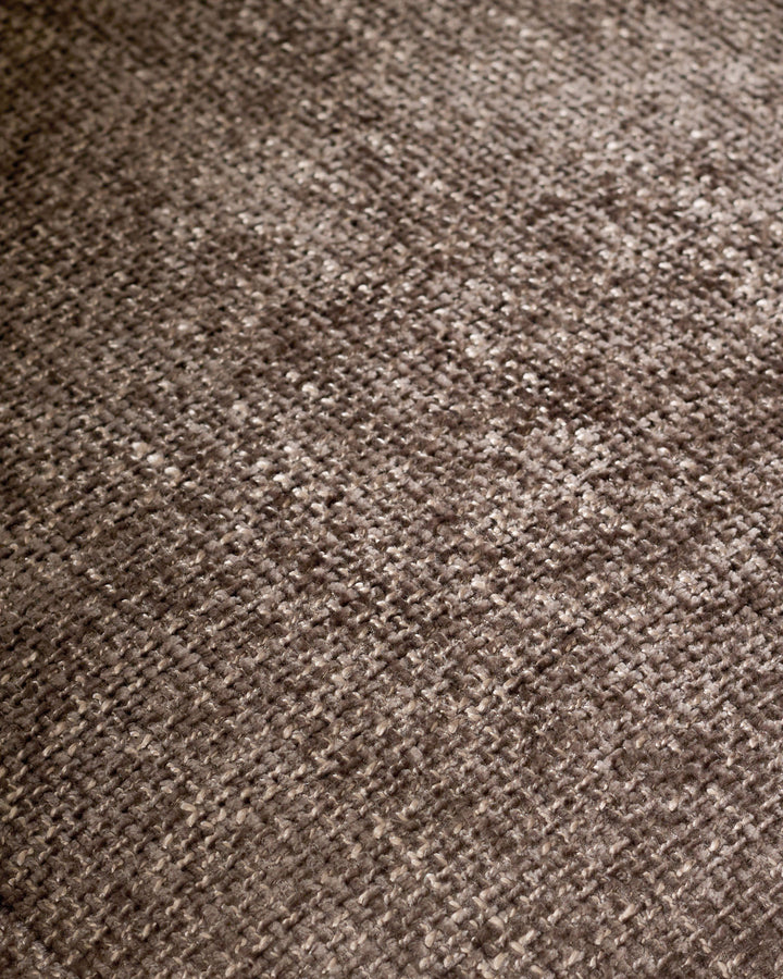 Close-up of mocha-colored textured fabric on Anya accent chair showing woven weave pattern and neutral tone.
