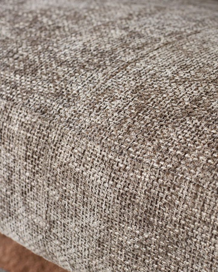 Close-up of Anya accent sofa fabric in mocha, showing textured woven material with neutral tone.