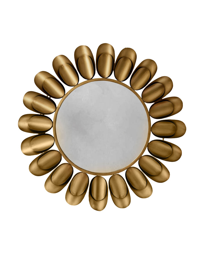 Gold decorative round mirror with an ornate sunburst frame featuring oval petal-shaped details arranged in a radial pattern.