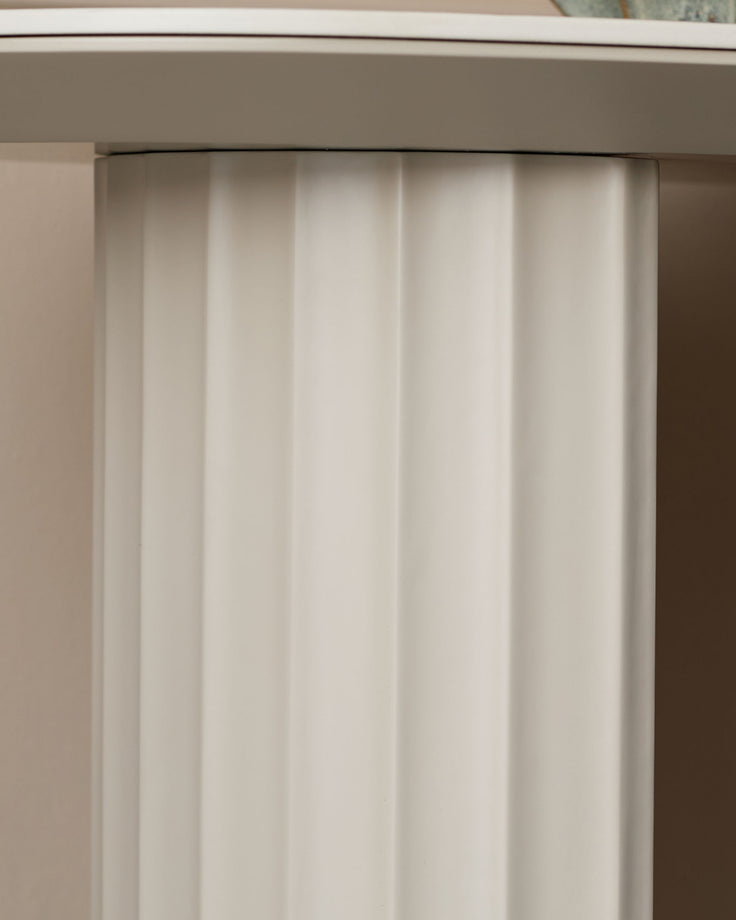 Austin console table in natural ceramic with vertical ribbed texture detail on the front panel.